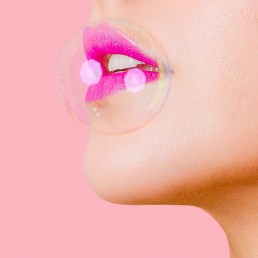 Pink creative beauty shoot with bubbles. Styled editorial photography by Marianne Taylor.