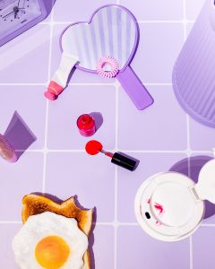 Girl Breakfast. Colourful still life photography in lilac with art direction and styling by HIYA MARIANNE photo production studio.